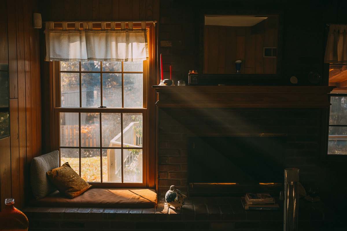 fireplace white wooden framed glass window indoors